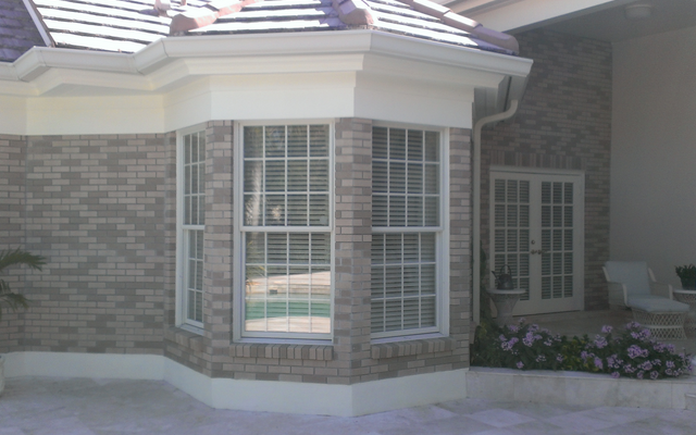 New construction impact windows and impact rated french doors